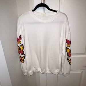 White butterfly sweater